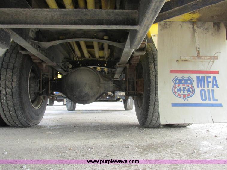 image for item I8812 1999 Freightliner FL70 fuel truck