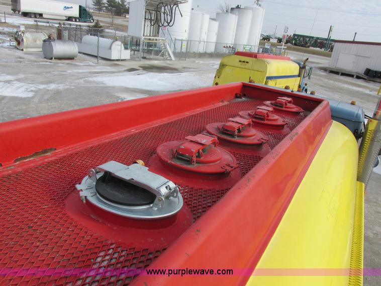 image for item I8812 1999 Freightliner FL70 fuel truck