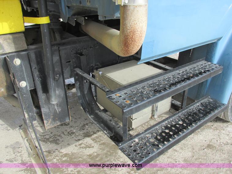 image for item I8812 1999 Freightliner FL70 fuel truck