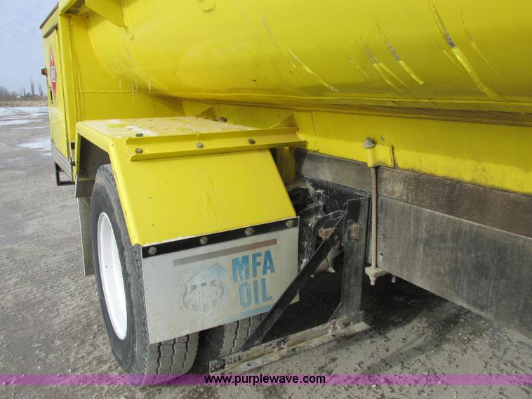 image for item I8812 1999 Freightliner FL70 fuel truck