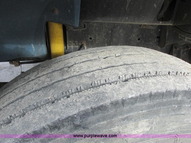 image for item I8812 1999 Freightliner FL70 fuel truck