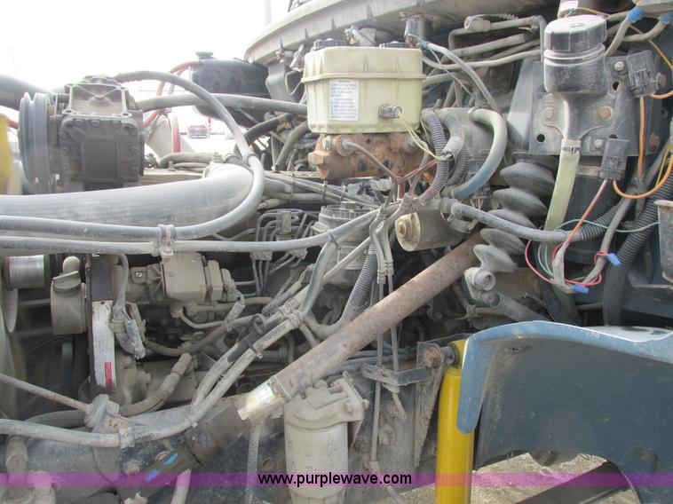 image for item I8812 1999 Freightliner FL70 fuel truck