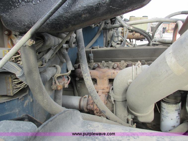 image for item I8812 1999 Freightliner FL70 fuel truck