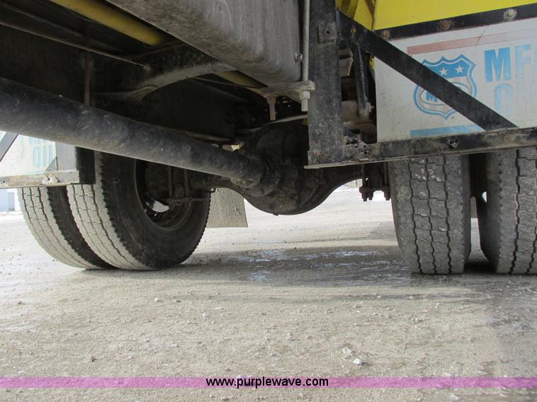 image for item I8812 1999 Freightliner FL70 fuel truck