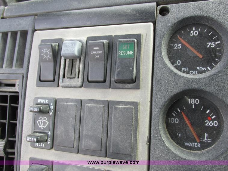 image for item I8812 1999 Freightliner FL70 fuel truck