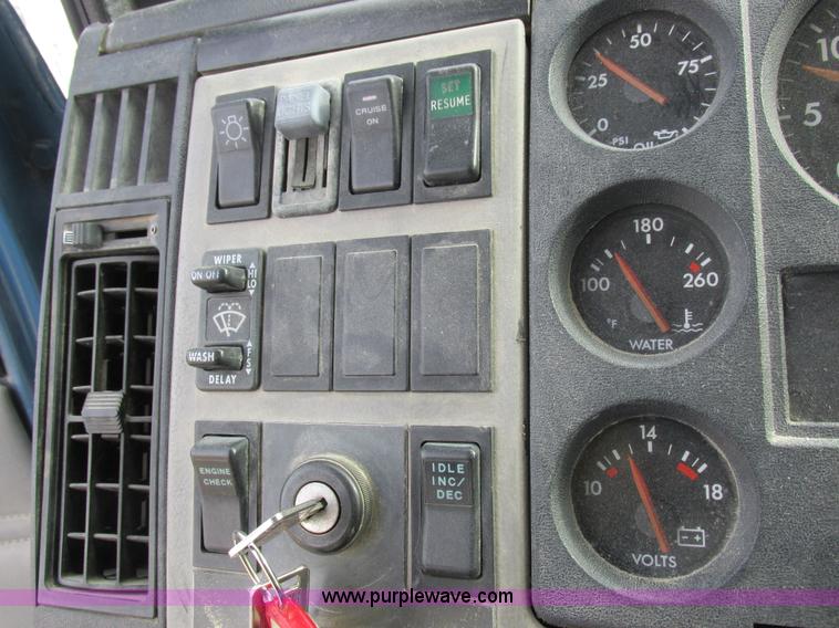 image for item I8812 1999 Freightliner FL70 fuel truck