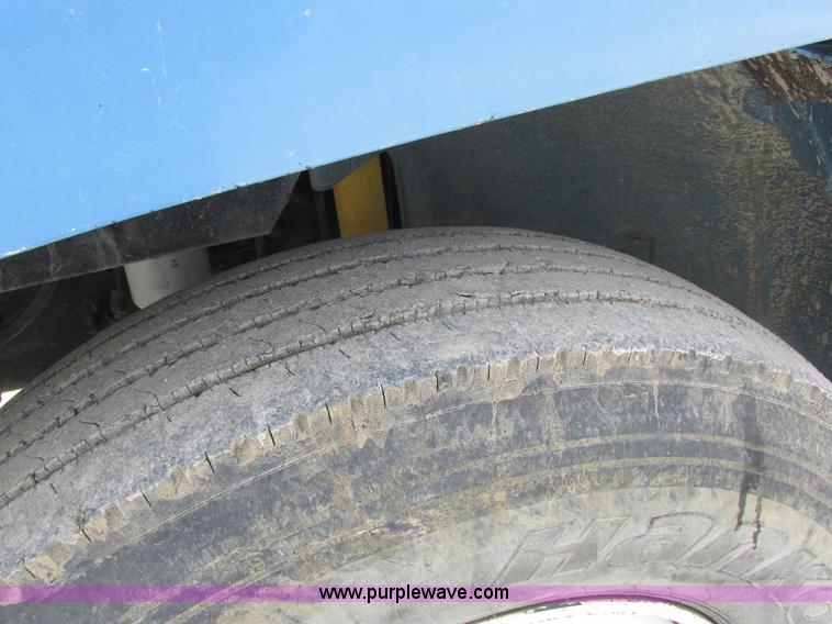 image for item I8812 1999 Freightliner FL70 fuel truck