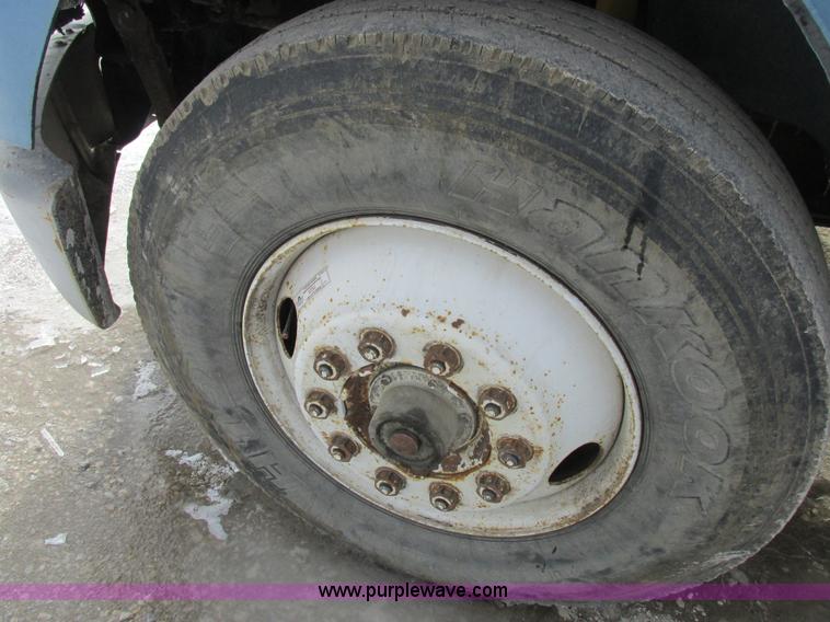 image for item I8812 1999 Freightliner FL70 fuel truck