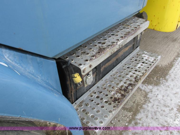 image for item I8812 1999 Freightliner FL70 fuel truck