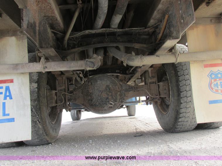 image for item I8812 1999 Freightliner FL70 fuel truck