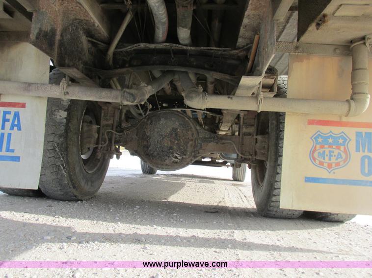 image for item I8812 1999 Freightliner FL70 fuel truck