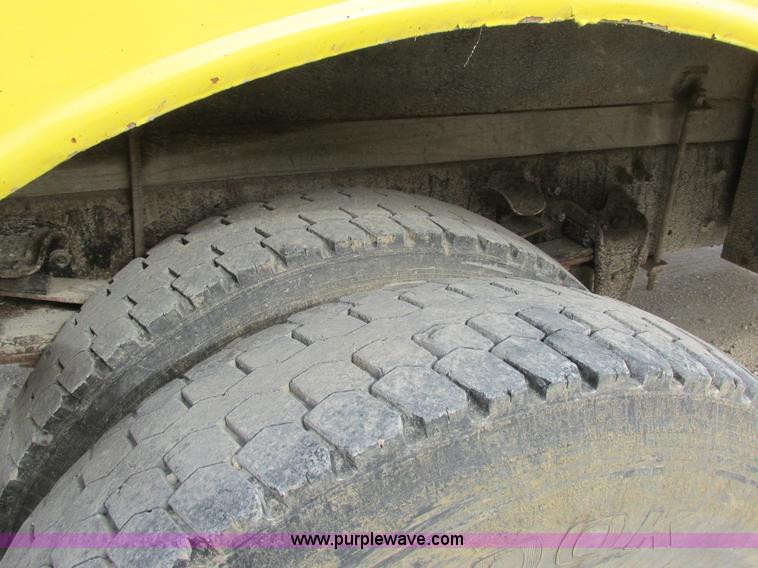 image for item I8812 1999 Freightliner FL70 fuel truck