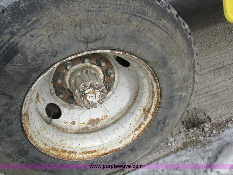 image for item I8812 1999 Freightliner FL70 fuel truck