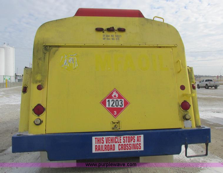 image for item I8813 1998 Freightliner FL70 fuel truck