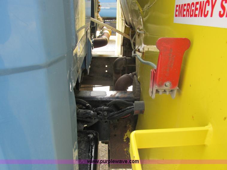 image for item I8813 1998 Freightliner FL70 fuel truck