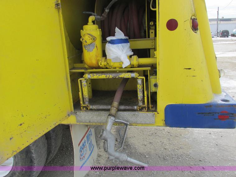 image for item I8813 1998 Freightliner FL70 fuel truck