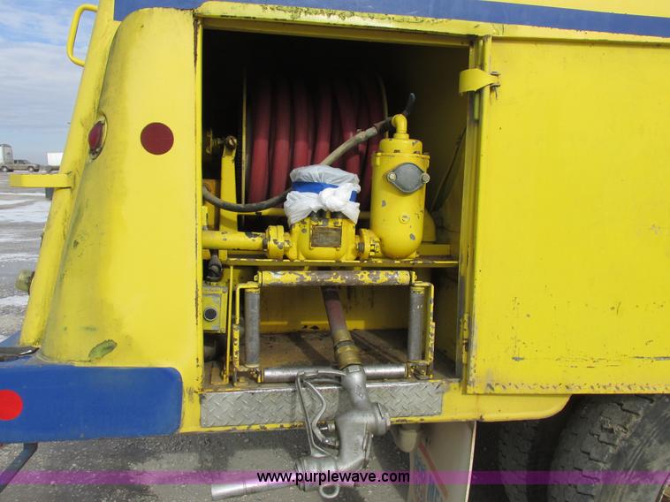 image for item I8813 1998 Freightliner FL70 fuel truck