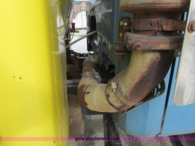 image for item I8813 1998 Freightliner FL70 fuel truck