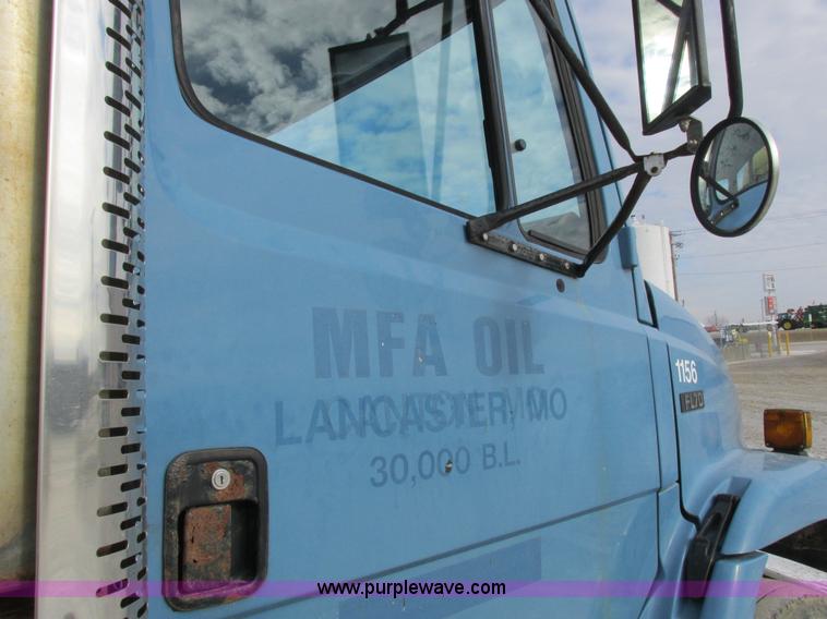 image for item I8813 1998 Freightliner FL70 fuel truck
