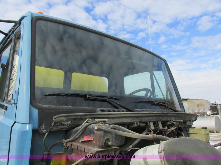 image for item I8813 1998 Freightliner FL70 fuel truck