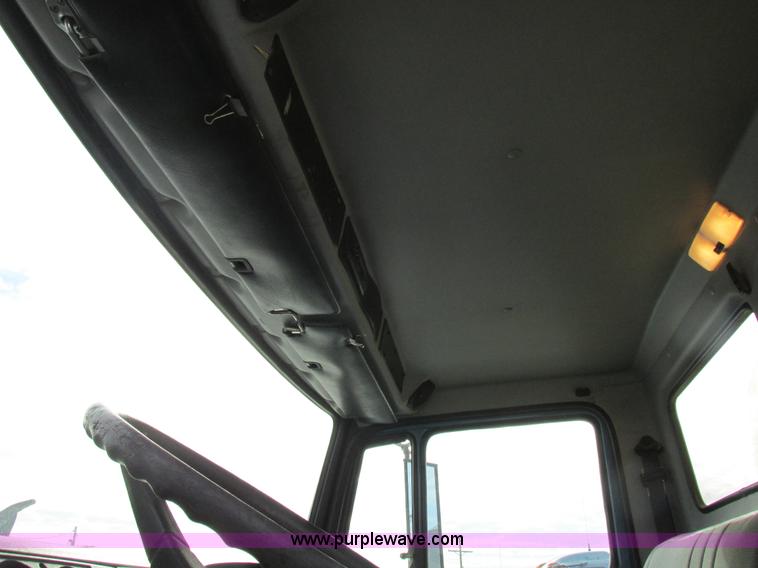 image for item I8813 1998 Freightliner FL70 fuel truck