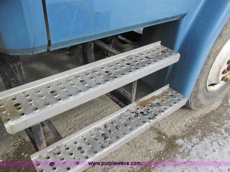 image for item I8813 1998 Freightliner FL70 fuel truck