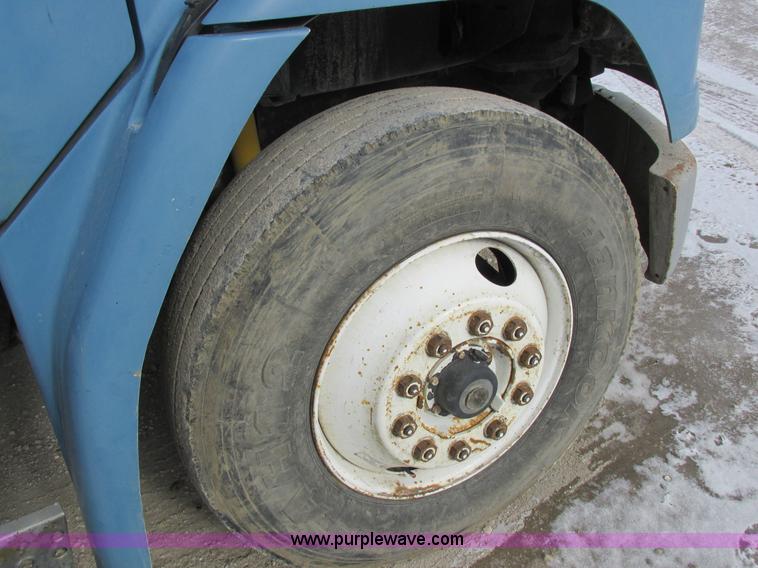 image for item I8813 1998 Freightliner FL70 fuel truck