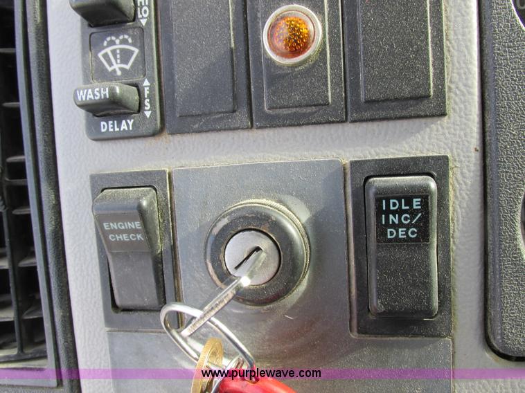 image for item I8813 1998 Freightliner FL70 fuel truck