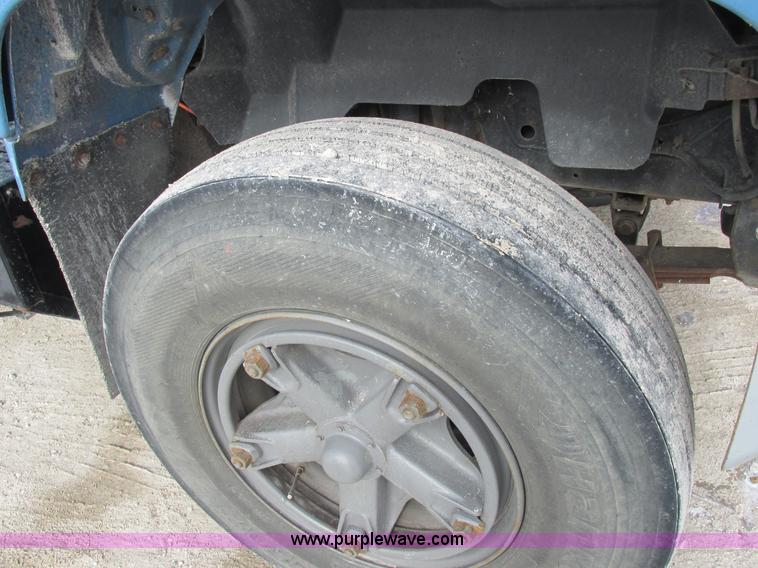 image for item I8813 1998 Freightliner FL70 fuel truck