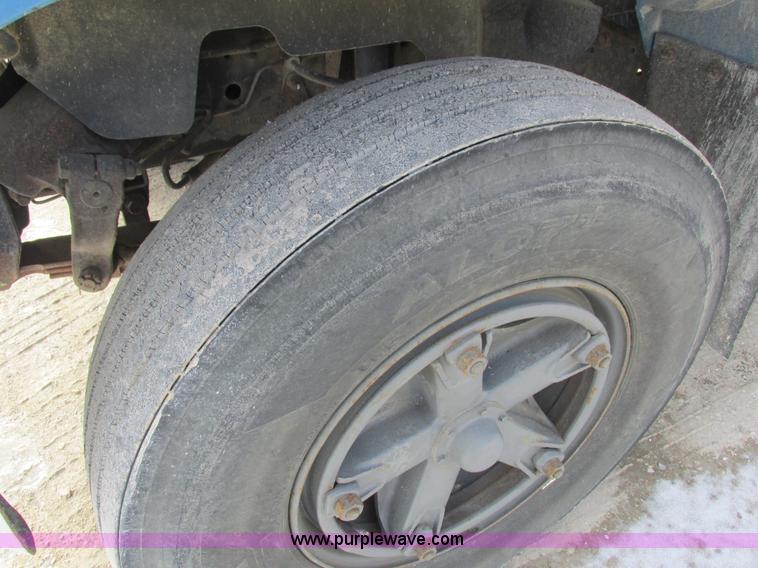 image for item I8813 1998 Freightliner FL70 fuel truck