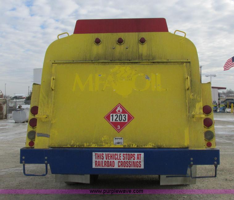 image for item I8814 2000 Freightliner FL70 fuel truck