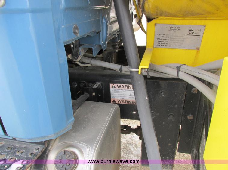 image for item I8814 2000 Freightliner FL70 fuel truck