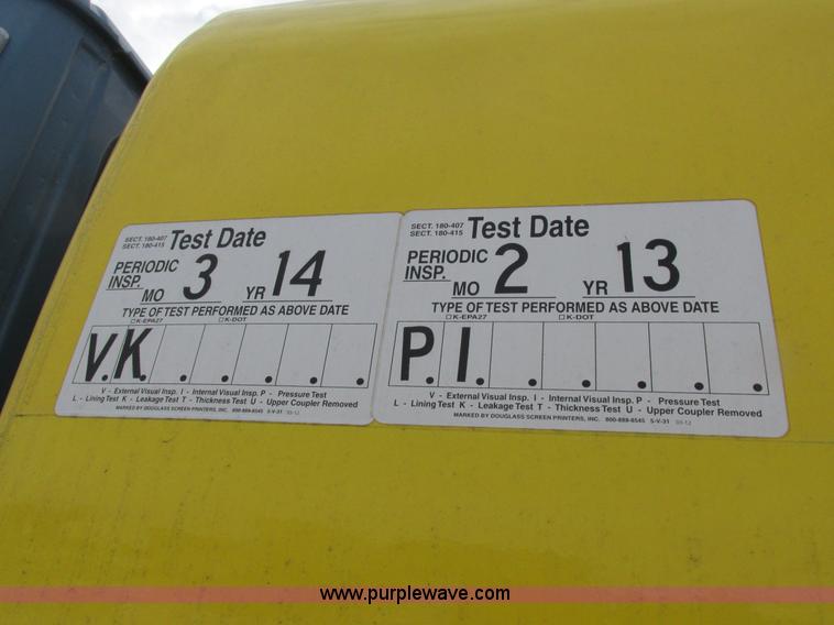 image for item I8814 2000 Freightliner FL70 fuel truck