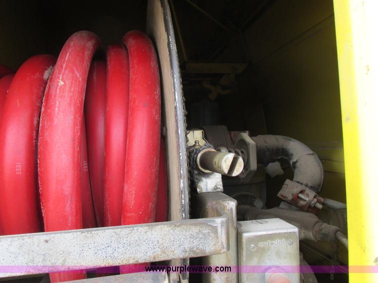 image for item I8814 2000 Freightliner FL70 fuel truck