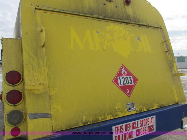 image for item I8814 2000 Freightliner FL70 fuel truck