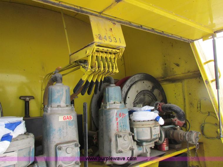 image for item I8814 2000 Freightliner FL70 fuel truck