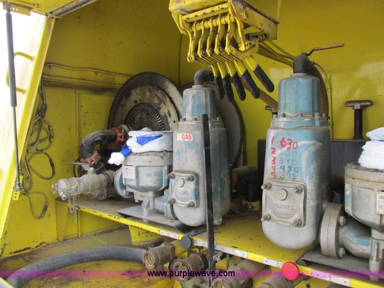 image for item I8814 2000 Freightliner FL70 fuel truck