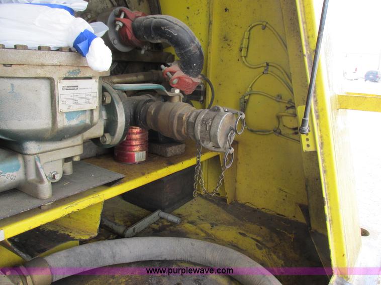 image for item I8814 2000 Freightliner FL70 fuel truck