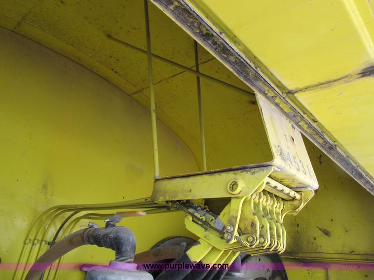 image for item I8814 2000 Freightliner FL70 fuel truck