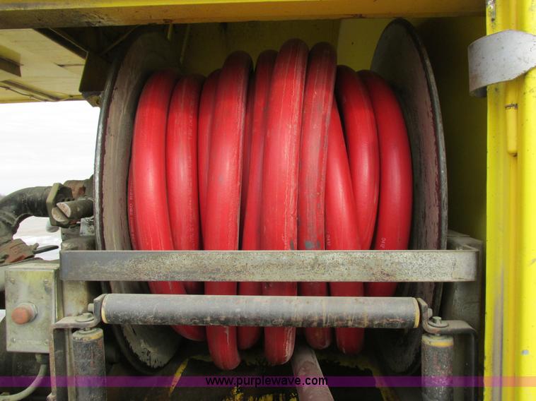 image for item I8814 2000 Freightliner FL70 fuel truck