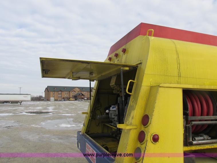 image for item I8814 2000 Freightliner FL70 fuel truck