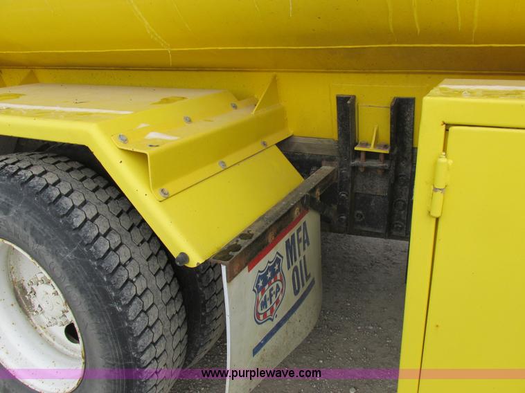 image for item I8814 2000 Freightliner FL70 fuel truck