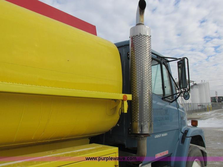 image for item I8814 2000 Freightliner FL70 fuel truck