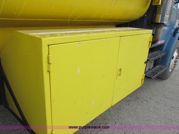 image for item I8814 2000 Freightliner FL70 fuel truck