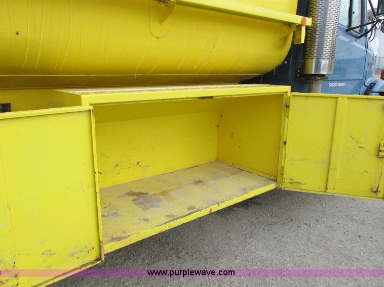 image for item I8814 2000 Freightliner FL70 fuel truck