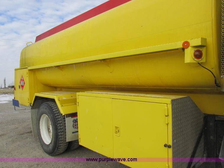 image for item I8814 2000 Freightliner FL70 fuel truck