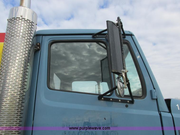 image for item I8814 2000 Freightliner FL70 fuel truck