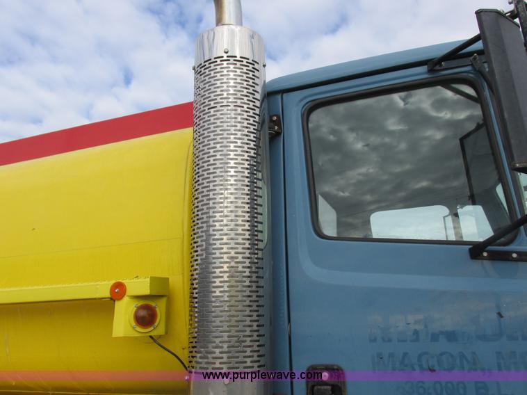 image for item I8814 2000 Freightliner FL70 fuel truck