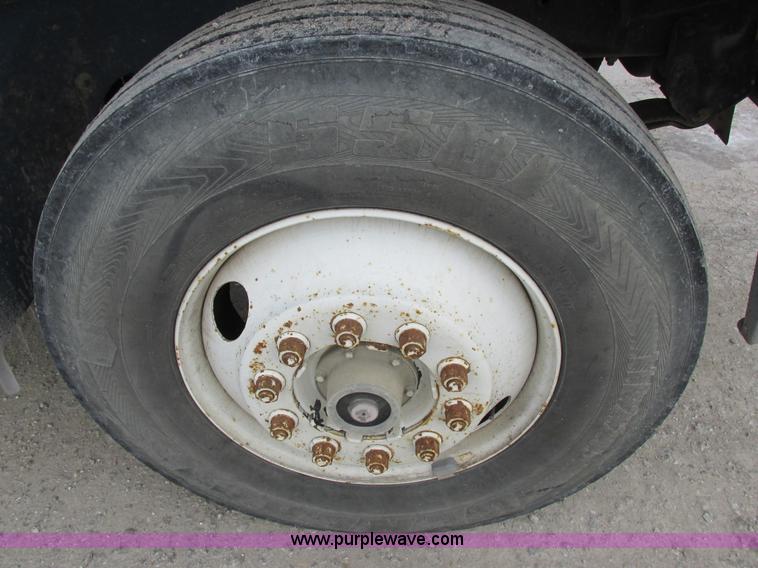 image for item I8814 2000 Freightliner FL70 fuel truck