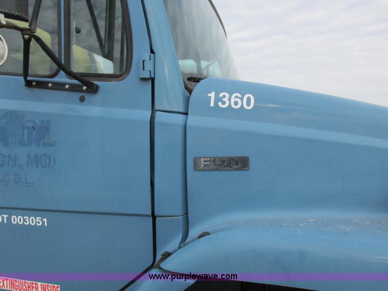 image for item I8814 2000 Freightliner FL70 fuel truck